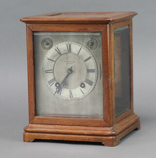 Muirhead and Arthur of Glasgow, a Ting Tang bracket clock, the 15cm rectangular, silvered dial with chime/silent and slow/fast dials, contained in a mahogany case 26cm h x 21cm w x 19cm, complete with pendulum and key 