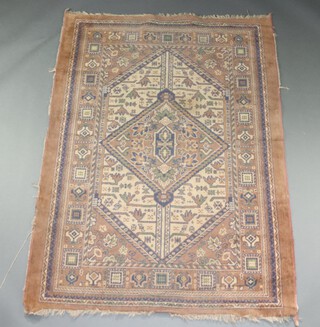 A pink and blue ground machine made  rug 179cm x 132cm 