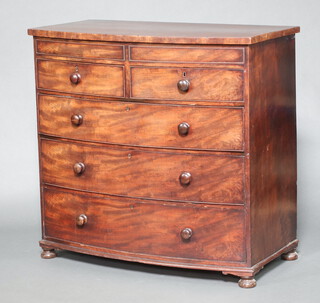 A 19th Century mahogany bow front chest of 2 short and 3 long graduated drawers, raised on bun feet 114cm h x 119cm w x 63cm d 