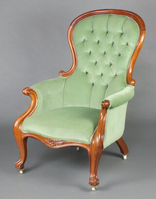 A Victorian mahogany show frame armchair upholstered in mint green material, raised on cabriole supports 108cm h x 68cm w x 64cm d (seat 28cm x 36cm) 