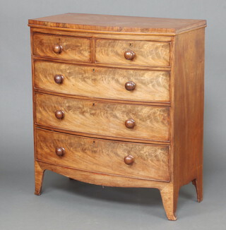 A 19th Century bleached mahogany bow front chest of 2 short and 3 long drawers with turned handles, raised on bracket feet 113cm h x 101cm w x 50cm d 