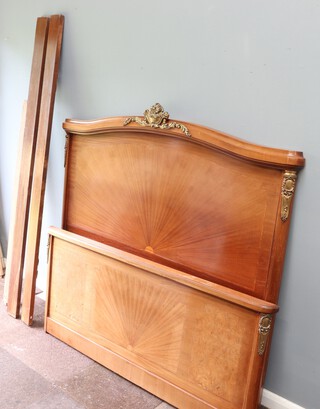 A French 19th/20th Century walnut double bedstead with gilt metal mounts 146cm h x 150cm w x 204cm l, complete with sides  