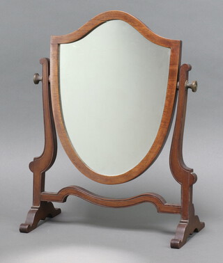 A Georgian style shield shaped plate dressing table mirror contained in a mahogany swing frame 42cm h x 31cm w x 16cm d 