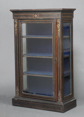 A Victorian ebonised and inlaid pier cabinet with gilt metal mounts, raise on a platform base 121cm h x 73cm w x 36cm d 