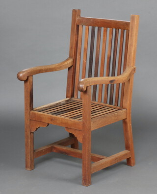 A teak stick and bar back open arm chair, formed from timber taken from HMS Renown, marked Made from the timber from HMS Renown the ship that took King George and Queen Mary, when Princess of Wales to India to attend the Durbar 107cm h x 66cm w x 60cm d 