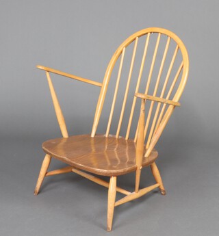 Ercol, an elm and beech comb back open armchair  82cm h x 70cm w x 53cm d (seat 30cm x 35cm)  