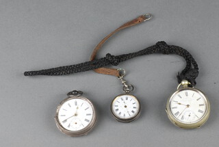 A Continental silver key wind pocket watch with seconds at 6 o'clock  (no glass and seconds hand missing), a lady's silver fob watch and a plated key wind pocket watch 