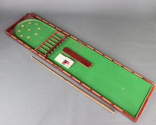 A 19th Century mahogany table top bagatelle 5cm h x 216cm l x 51cm w, complete with cue and balls 