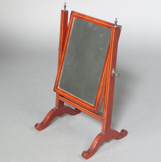 A 19th Century rectangular plate dressing table mirror contained in a mahogany swing frame 55cm h x 31cm w x 25cm d 