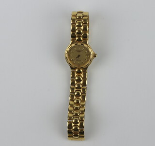 A lady's gilt cased Longines quartz calendar wristwatch on a gilt bracelet together with 2 spare links 