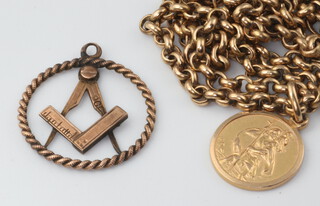 A 9ct yellow gold necklace 56cm with a St Christopher and Masonic charm 10.5 grams 