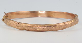 A 9ct yellow gold engraved bangle 5.5 grams 