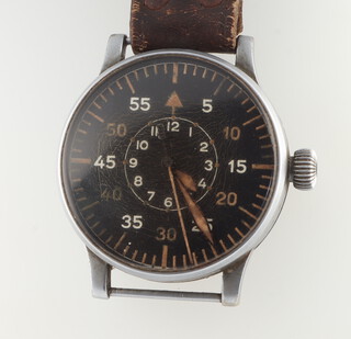 Lange and Sohne, a Second World War German Luftwaffe oversized military manual wind observation wristwatch contained in a 55mm steel case, circa 1940, with black dial with outer 60 seconds divisions and 5 second markers, the inner with 12 hour chapter ring, blue steel sword hands with luminous inserts and white centre seconds hand, the outer case marked around the side FI 23883, the movement marked K31, the back cover numbered 1052, the inner back cover marked B-UHR Thommen numbered 127-560.A.1. B.L.T.1052. FI.23883. Wempe Hamburg, the watch is in working order and with half of it's original leather strap with clasp