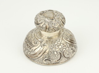 A Victorian repousse silver inkwell with engraved monogram and scrolling flowers London 1899, 9cm