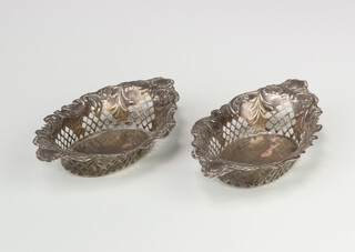 A pair of Victorian repousse silver boat shaped bonbon dishes Birmingham 1898, 16cm, 88 grams, 