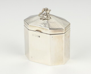 An Edwardian silver octagonal tea caddy with swing handle Sheffield 1901 135 grams, 10cm 