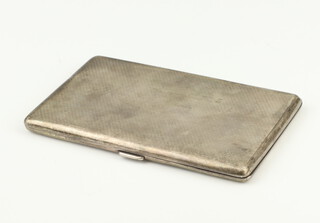 A silver engine turned cigarette case with engraved inscription London 1923, gross weight 161.6 grams 