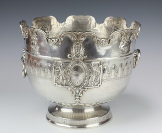 A good white metal repousse Monteith with shell and scroll rim and lion ring handles, having mythical beasts, galleons and architectural views, with fluted bottom, the base rim inscribed "To C E Reeve, from the Court of Directors of The Royal Exchange Assurance on it's Bicentenary 22nd June 1920", the underside inscribed The Stratford Upon Avon Studios Applied Art, 1705 grams, 26cm 