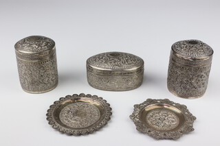 An Indian white metal oval box, 2 circular ditto and 2 dishes, 378 grams