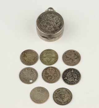 An Edwardian engraved circular silver sovereign case (rubbed marks) 25mm and 8 George V and Victoria three pence pieces, gross weight 22 grams 