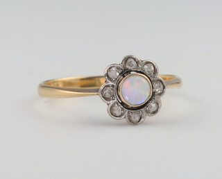 A yellow metal 18ct opal and diamond cluster ring 2.1 grams, size Q 1/2