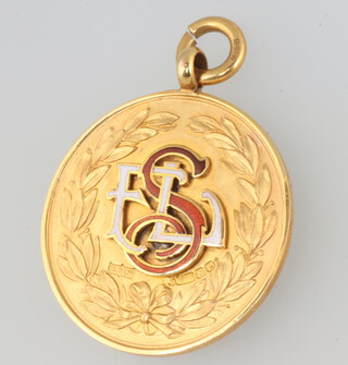 Of Football interest, a 9ct yellow gold enamelled sports medallion, engraved, Championship 1923-4. Runners Up. J.Gregory.  boxed, 13 grams (John known as Jack Gregory played for Queens Park Rangers 1912 - 1923 returning to them after WWI)