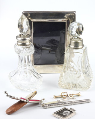 A Victorian miniature silver photograph frame with crown finial 4cm, 2 silver mounted scents, propelling pencil and miniature button hook, fruit knife, rectangular frame and a 9ct gold bar brooch 