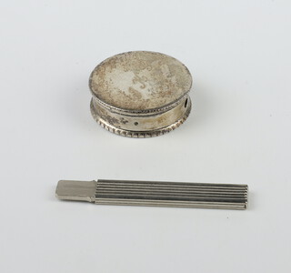 A circular silver pill box Birmingham 1978 and a pocket knife 