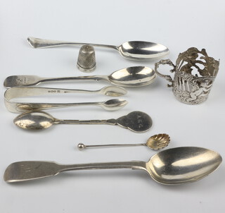 A Victorian Irish silver mustard spoon Dublin 1877, minor spoons, a tot holder, thimble etc, 106 grams 