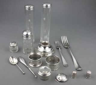 A George III silver dinner fork London 1910, 4 silver topped toilet jars, a fork, spoon and 2 thimbles, weighable silver 185 grams 