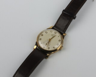 A gentleman's Smiths 9ct gold cased wristwatch with seconds at 6 o'clock, contained in a 30mm on a leather bracelet with presentation inscription