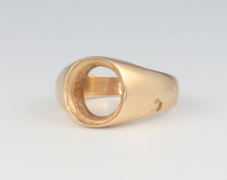 A yellow metal ring mount 5 grams 