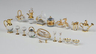 Ten Swarovski Crystal  "Memories Classics" figures - parcel, ewer and glasses, merry go round, gramophone, flower pot, flower basket, 2 vessels, bicycle, watering can and basket with glasses, boxed 