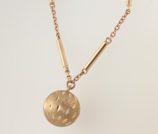 A 9ct yellow gold necklace 40cm, a ball pendant on a 9ct chain 45cm  9.7 grams 