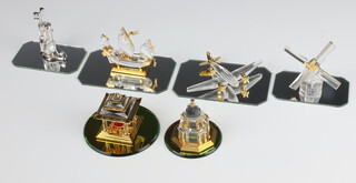 Six Swarovski Crystal  "Memories Journeys" - windmill, 2 pagodas, golf clubs, aeroplane and boat, boxed