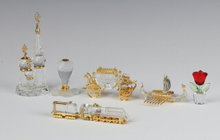 A collection of Swarovski Crystal  "Memories Journeys" - hot air balloon, Viking ship, loco and tender, coach, Russian temple 