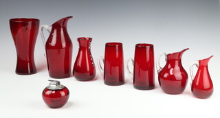 A Whitefriars mid-Century ruby glass jug 18cm, 2 smaller jugs, 2 glasses, a vase and a cigarette lighter 