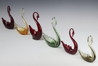 A Whitefriars red glass footed swan together with five other Whitefriars swans  20cm 