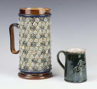 A Doulton Lambeth jug with geometric triangular decoration monogrammed E A, 1877, 23cm (some moulding missing) together with a ditto mug "Love From Daddy  to Jill Irene Feb 23rd 1925" no.3377 10cm 