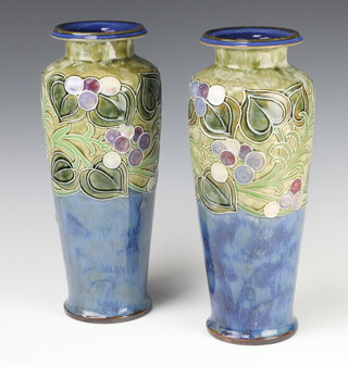 A pair of Royal Doulton oviform vases decorated with scrolling fruits and flowers 35cm 