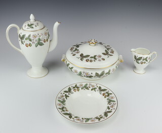 A Wedgwood Strawberry Hill pattern 80 piece dinner and coffee service comprising 3 circular twin handled vegetable dishes and 1 cover (finial glued), 12 dinner plates, 12 side plates (2 cracked), 12 tea plates, 2 oval meat plates, 8 pudding bowls, circular bread plate, sauce boat (cracked and repaired) and stand (2 chips to base), coffee pot, cream jug, lidded sugar bowl, 2 saucers, 8 large coffee cans (1 cracked)  and 8 saucers (1 cracked), 4 small coffee cans and 4 saucers 