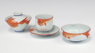 An early 20th Century Japanese tea bowl and cover decorated with carp, ditto bowl decorated carp and ditto cup and saucer 