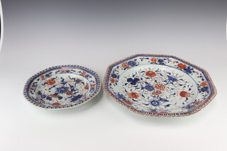 A 19th Century octagonal Imari plate decorated with flowering peony 38cm (stuck and riveted) together with a ditto circular plate decorated with flowers 27cm 