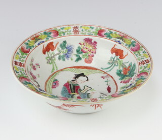 A 19th Century famille rose bowl decorated with a lady on a pavilion balcony enclosed by flowers 28cm 