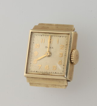 A lady's yellow metal 14k wristwatch, the dial inscribed Doxa in an 18mm case, 4.5 grams including glass