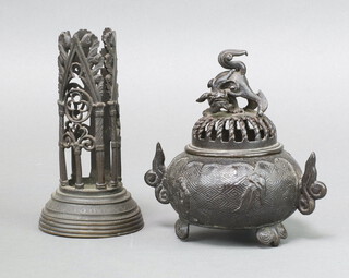 A Chinese cast bronze twin handled Koro decorated a Dog of Fo 11cm x 7cm, together with a bronze Gothic style vase holder 13cm x 7cm 