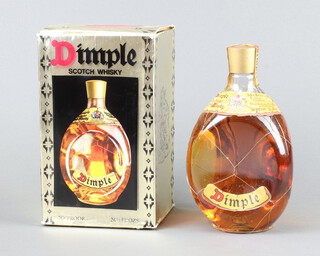 A 26 2/3 fl. oz. bottle of Dimple Haig whisky contained in original cardboard box 