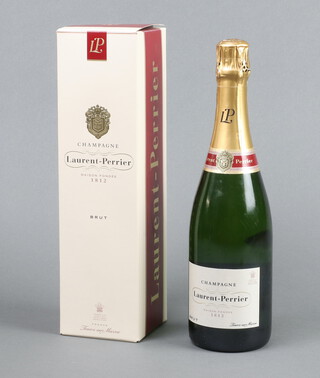 A bottle of Laurent-Perrier champagne boxed