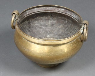 An Eastern brass jardiniere 24cm h x 34cm diam. 