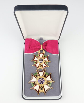 An American Legion of Merit Chief Commander's neck badge and breast star, case